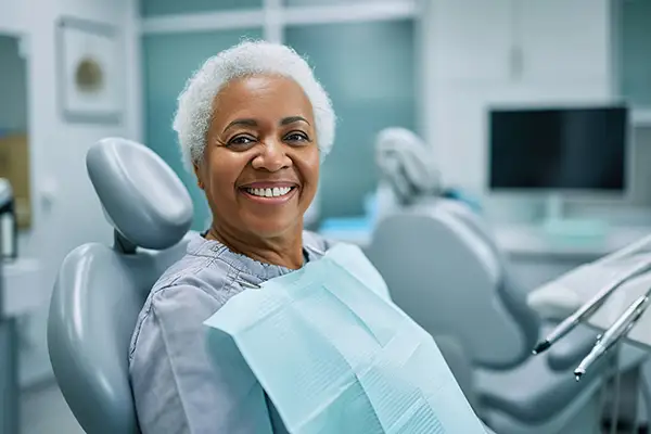 senior-dentistry-1 Senior patient smiling during a dental appointment